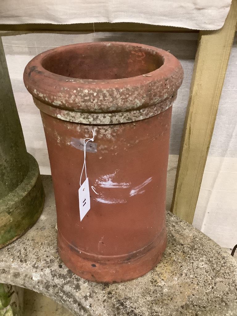 Two pottery chimney pots, larger 76cm high